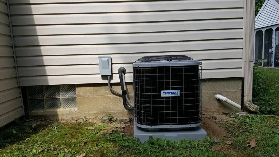 Central air conditioning condenser installed